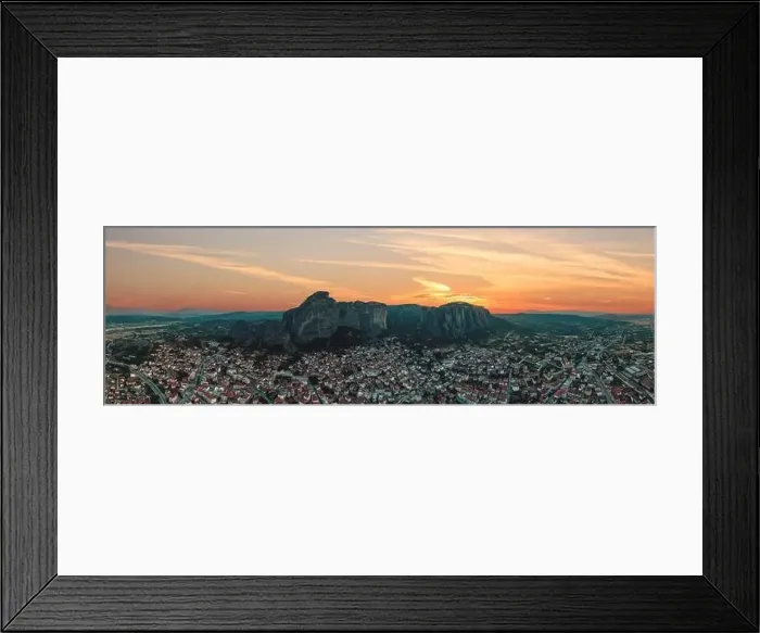 Framed Print : Meteora Greece panorama. Sunset and orange sky over Kalabaka town. Rock formations landscape, Europe travel destination Framed Print : Meteora Greece panorama. Sunset and orange sky over Kalabaka town. Rock formations landscape, Europe travel destination