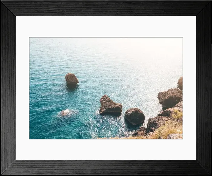 Framed Print : Scenic seascape view with rocks and cliffs in shallow waters, during high tide. Moody picture Framed Print : Scenic seascape view with rocks and cliffs in shallow waters, during high tide. Moody picture