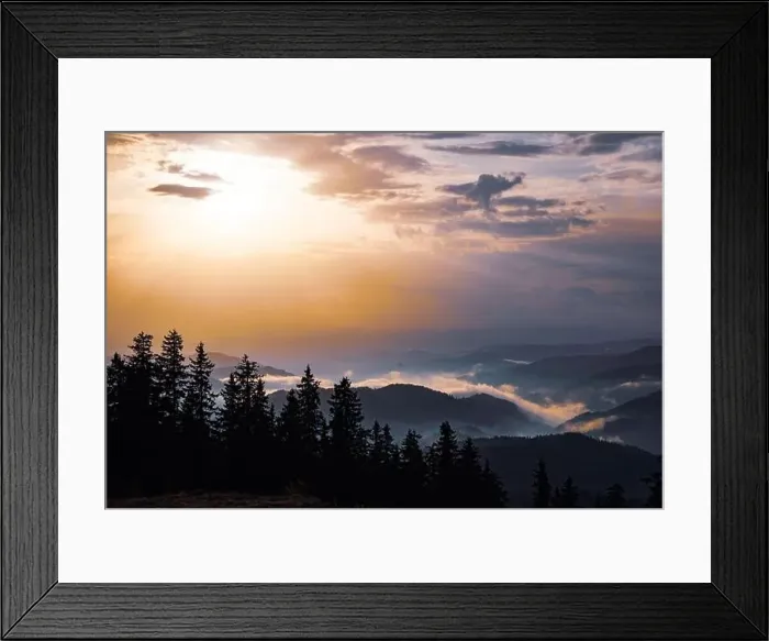 Framed Print : Cold cloudy rainy weather over low hills covered with spruce evergreen forests in Rhodope Mountains against backdrop of