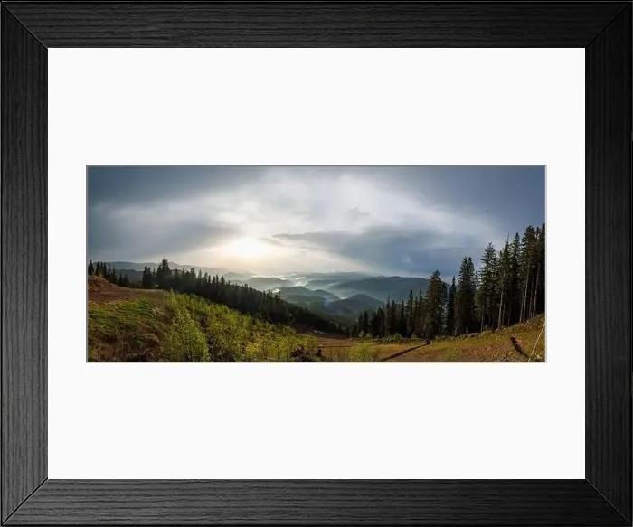 Framed Print : Panorama on cold cloudy weather over low hills covered with spruce evergreen forests in Rhodope Mountains against Framed Print : Panorama on cold cloudy weather over low hills covered with spruce evergreen forests in Rhodope Mountains against