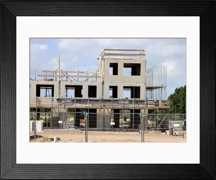 Framed Print : Construction of new houses with infrastructure in new residential area Westergouwe in Gouda the Netherlands Framed Print : Construction of new houses with infrastructure in new residential area Westergouwe in Gouda the Netherlands