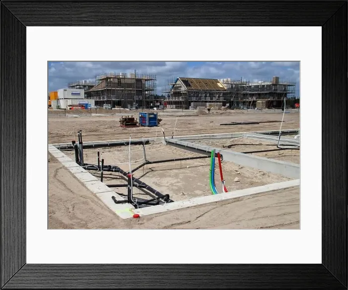 Framed Print : Construction of new houses with infrastructure in new residential area Westergouwe in Gouda the Netherlands Framed Print : Construction of new houses with infrastructure in new residential area Westergouwe in Gouda the Netherlands