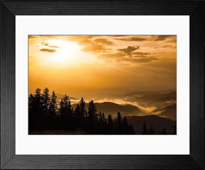 Framed Print : Cold cloudy rainy weather over low hills covered with spruce evergreen forests in Rhodope Mountains against backdrop of