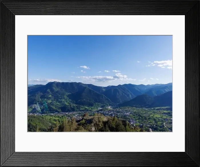 Framed Print : View from high rock to old village town of Smolyan with green meadows for cattle walking and ancient houses