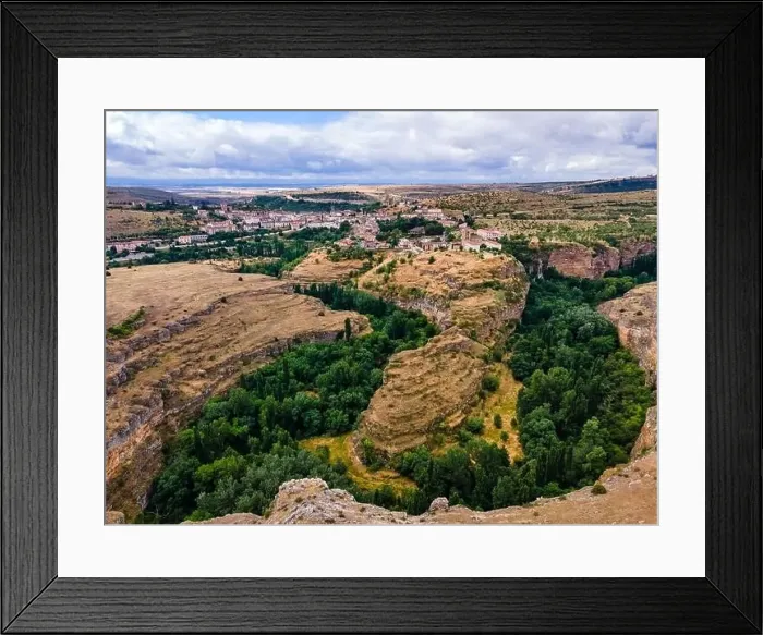 Framed Print : Vegetation at the foot of the hills that house the medieval village of Sepulveda in Spain Framed Print : Vegetation at the foot of the hills that house the medieval village of Sepulveda in Spain