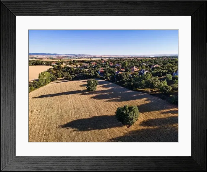 Framed Print : Aerial view of the countryside of Castilla with houses among the trees. Segovia Framed Print : Aerial view of the countryside of Castilla with houses among the trees. Segovia