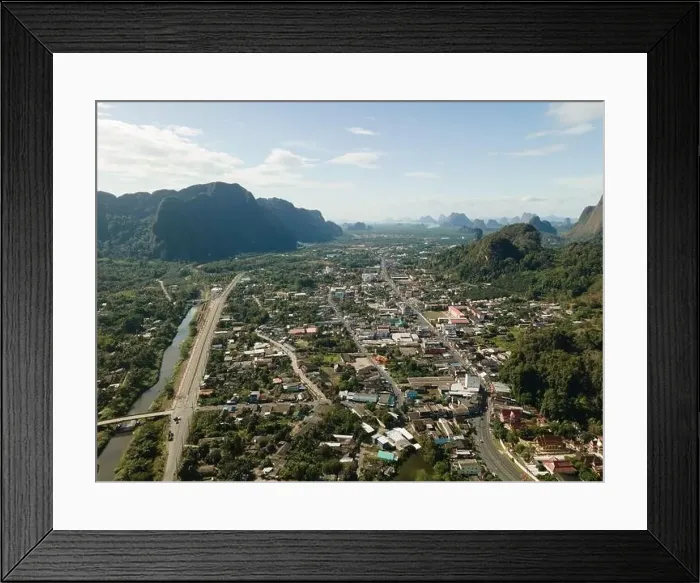 Framed Print : Aerial view of the town of Phang Nga tucked in between limestones Framed Print : Aerial view of the town of Phang Nga tucked in between limestones