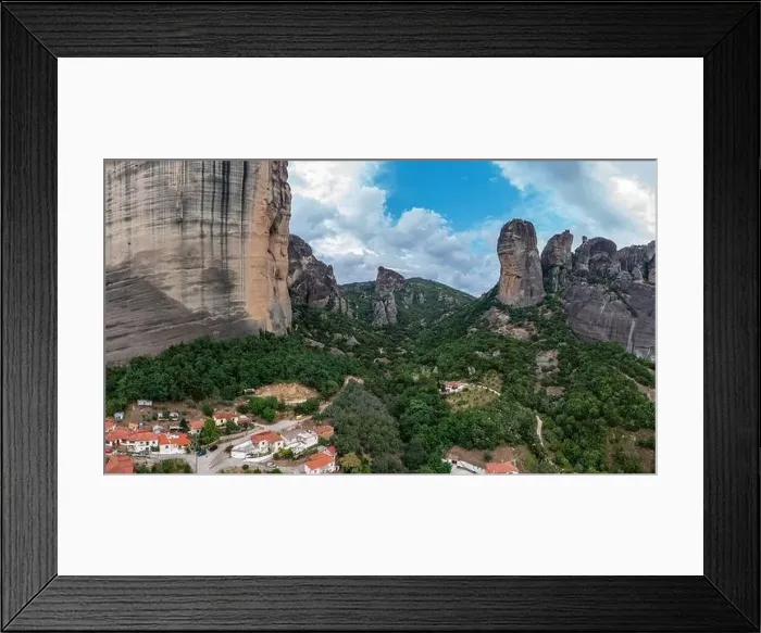 Framed Print : Meteora Greece. Blue sky with clouds over Monastery buildings on top of rocks and Kalambaka town and valley Framed Print : Meteora Greece. Blue sky with clouds over Monastery buildings on top of rocks and Kalambaka town and valley