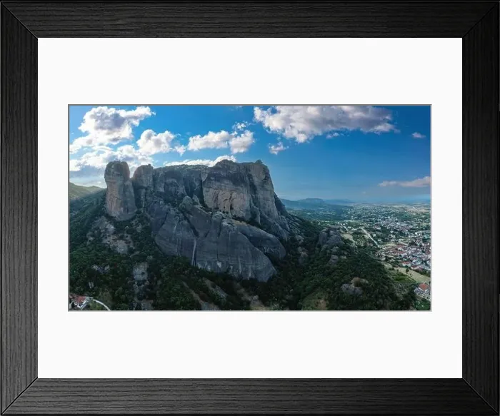 Framed Print : Meteora Greece at sunrise, Blue sky with clouds over Monastery buildings on top of rocks and Kalambaka town and valley Framed Print : Meteora Greece at sunrise, Blue sky with clouds over Monastery buildings on top of rocks and Kalambaka town and valley