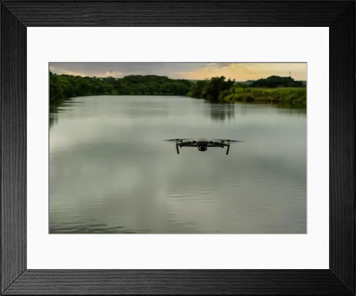 Framed Print : photo of a drone flying over the tiete river in a cloudy morning Framed Print : photo of a drone flying over the tiete river in a cloudy morning