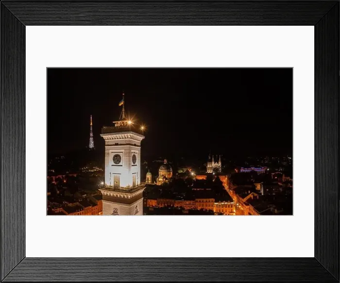 Framed Print : Aerial view on Lviv city hall at night from drone Framed Print : Aerial view on Lviv city hall at night from drone