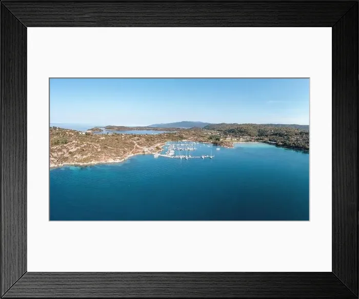 Framed Print : Sithonia Chalkidiki, Greece. Ormos Panagias bay and boat marina aerial drone view, clear blue sky, sunny summer day Framed Print : Sithonia Chalkidiki, Greece. Ormos Panagias bay and boat marina aerial drone view, clear blue sky, sunny summer day