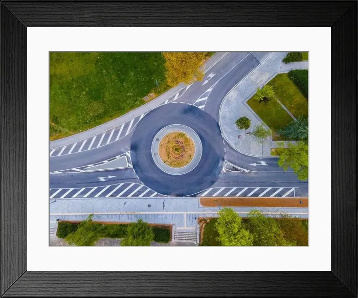Framed Print : Top down aerial view of a traffic roundabout on a main road in a city in Bulgaria. High quality photo Framed Print : Top down aerial view of a traffic roundabout on a main road in a city in Bulgaria. High quality photo