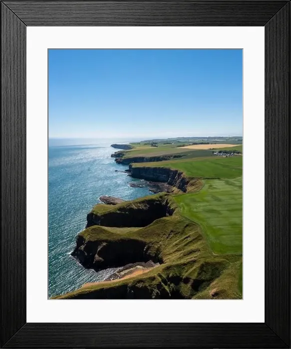 Framed Print : A vertical view of the cliffs and fields on the wild and rugged North Sea shore of Aberdeenshire Framed Print : A vertical view of the cliffs and fields on the wild and rugged North Sea shore of Aberdeenshire