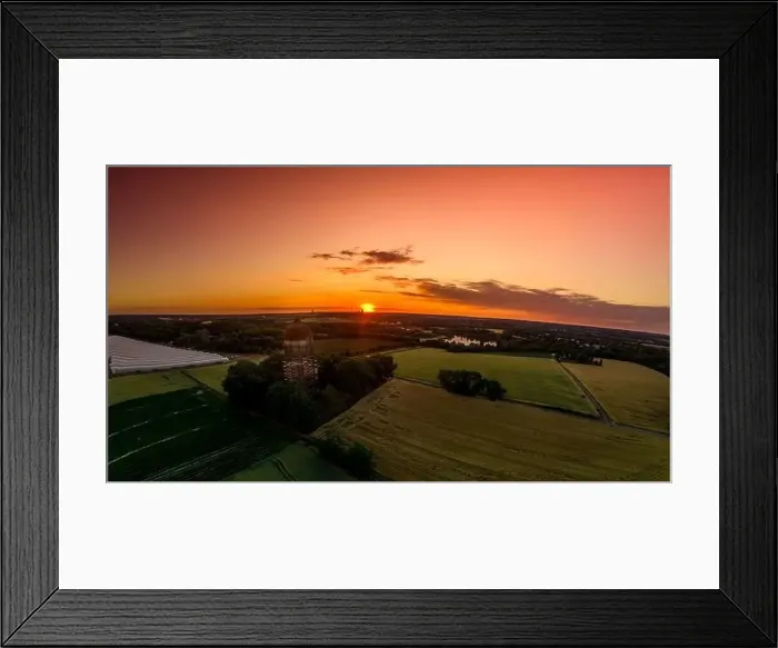 Framed Print : Drone shot of a beautiful sunset at the old water tank the Lanstroper Ei. The glowing sky is spectacular Framed Print : Drone shot of a beautiful sunset at the old water tank the Lanstroper Ei. The glowing sky is spectacular