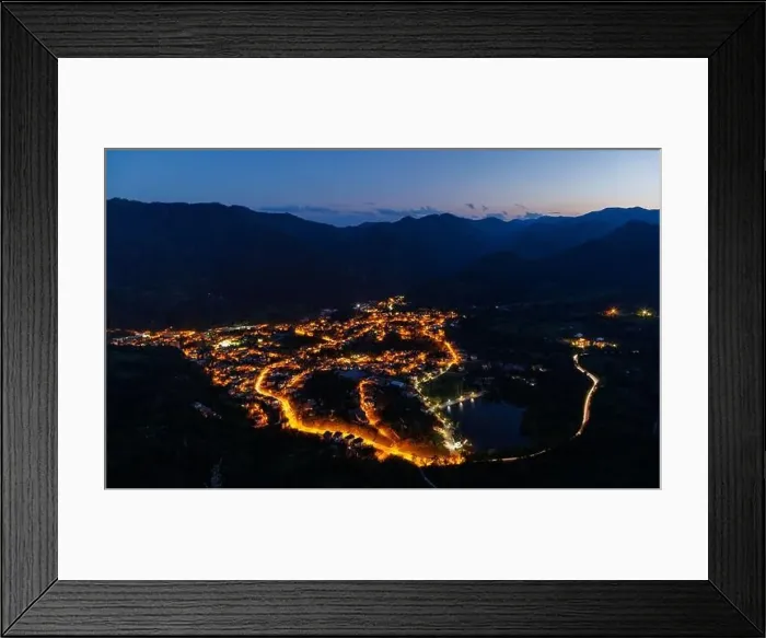 Framed Print : Bright sparkling mountain town of Smolyan with multi-colored night electric lights Framed Print : Bright sparkling mountain town of Smolyan with multi-colored night electric lights