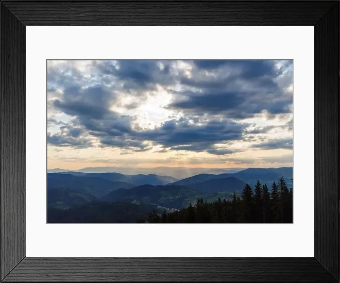 Framed Print : Cold cloudy rainy weather over low hills covered with spruce evergreen forests in Rhodope Mountains against backdrop of Framed Print : Cold cloudy rainy weather over low hills covered with spruce evergreen forests in Rhodope Mountains against backdrop of