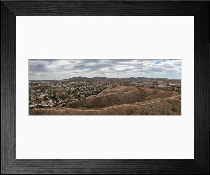 Framed Print : Aerial view of US Mexico Border fence in Nogales, Arizona Framed Print : Aerial view of US Mexico Border fence in Nogales, Arizona