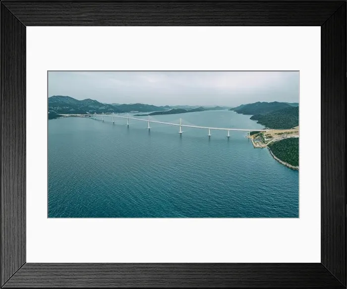 Framed Print : The Peljesac bridge connects the mainland with the peninsula Framed Print : The Peljesac bridge connects the mainland with the peninsula