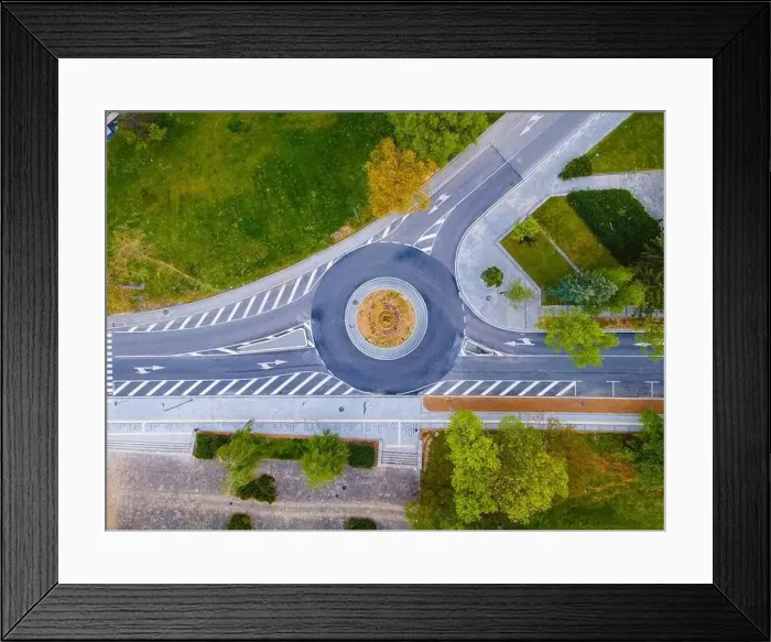 Framed Print : Top down aerial view of a traffic roundabout on a main road in a city in Bulgaria. High quality photo Framed Print : Top down aerial view of a traffic roundabout on a main road in a city in Bulgaria. High quality photo