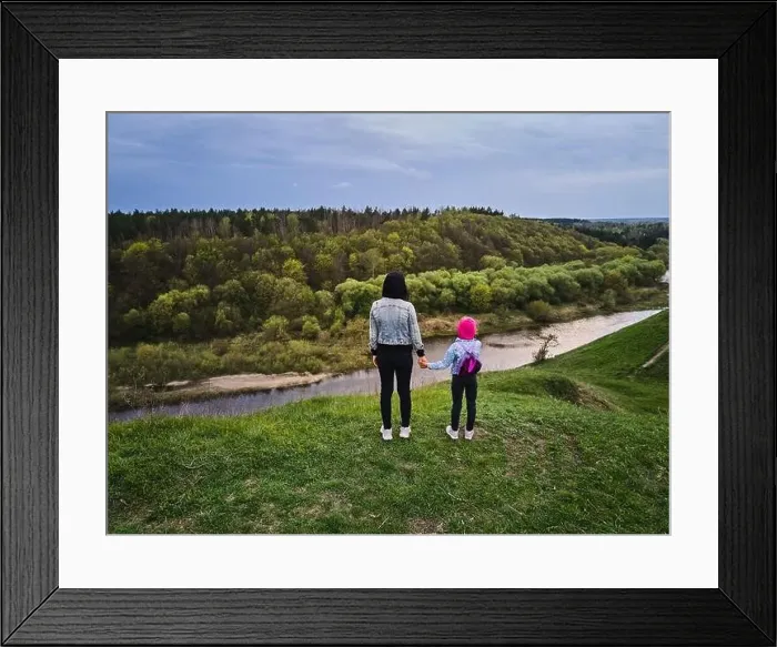 Framed Print : Mother and daughter enjoys the view on the coast Sluch river hills, Gubkiv village Travel destinations in Ukraine
