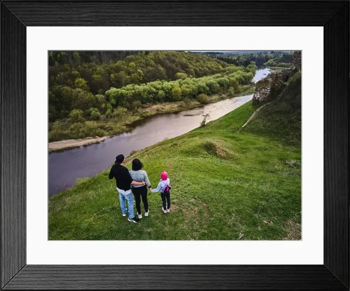 Framed Print : Mother, father daughter enjoys the view on the coast Sluch river hills, Gubkiv village Travel destinations in Ukraine Framed Print : Mother, father daughter enjoys the view on the coast Sluch river hills, Gubkiv village Travel destinations in Ukraine