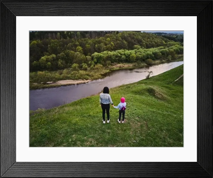 Framed Print : Mother and daughter enjoys the view on the coast Sluch river hills, Gubkiv village Travel destinations in Ukraine Framed Print : Mother and daughter enjoys the view on the coast Sluch river hills, Gubkiv village Travel destinations in Ukraine