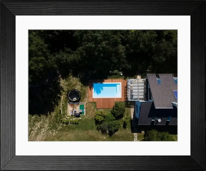 Framed Print : Drone flight over pool with nice wooden terrace surrounded by green lawn in beautiful garden Framed Print : Drone flight over pool with nice wooden terrace surrounded by green lawn in beautiful garden