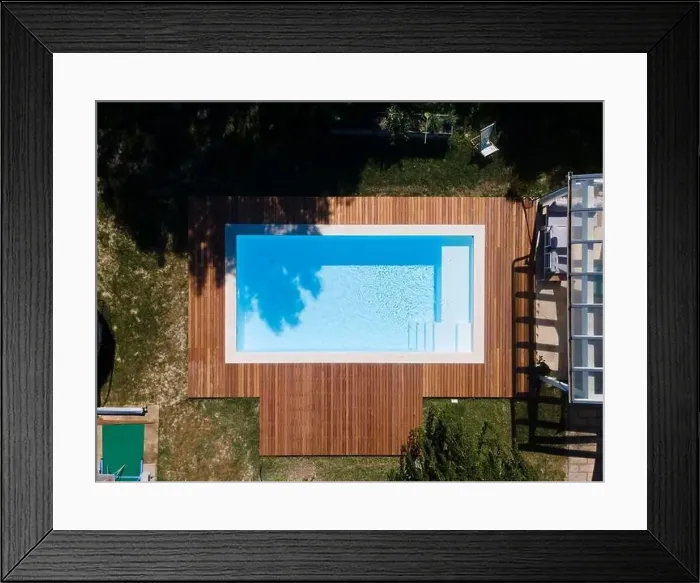 Framed Print : Drone flight over pool with nice wooden terrace surrounded by green lawn in beautiful garden Framed Print : Drone flight over pool with nice wooden terrace surrounded by green lawn in beautiful garden