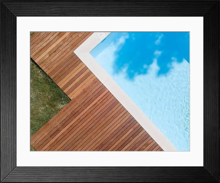 Framed Print : Drone flight over pool with nice wooden terrace surrounded by green lawn in beautiful garden Framed Print : Drone flight over pool with nice wooden terrace surrounded by green lawn in beautiful garden