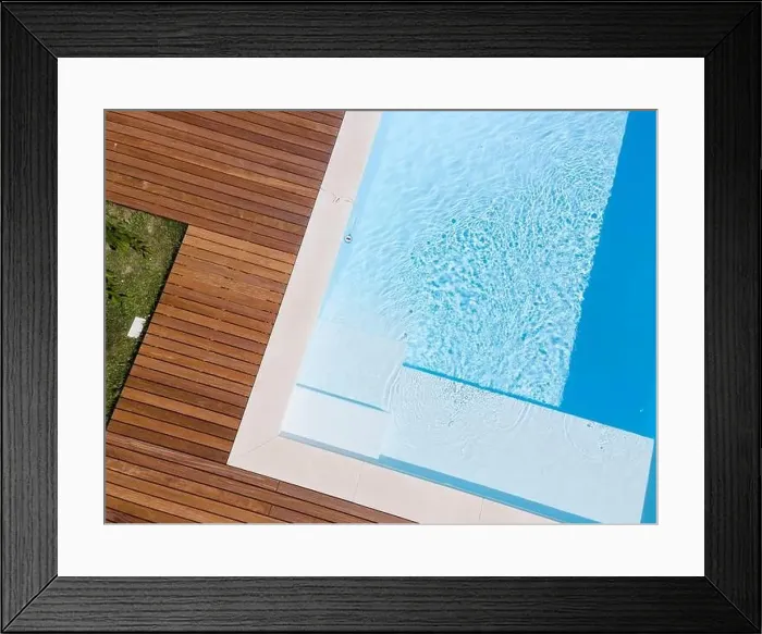 Framed Print : Drone flight over pool with nice wooden terrace surrounded by green lawn in beautiful garden Framed Print : Drone flight over pool with nice wooden terrace surrounded by green lawn in beautiful garden