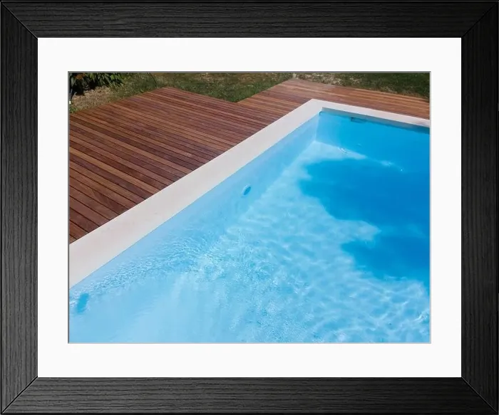 Framed Print : Drone flight over pool with nice wooden terrace surrounded by green lawn in beautiful garden Framed Print : Drone flight over pool with nice wooden terrace surrounded by green lawn in beautiful garden
