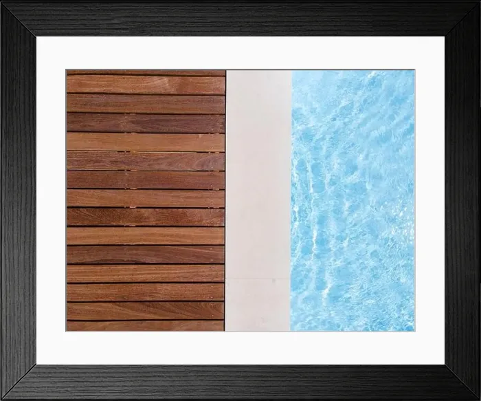 Framed Print : Drone flight over pool with nice wooden terrace surrounded by green lawn in beautiful garden Framed Print : Drone flight over pool with nice wooden terrace surrounded by green lawn in beautiful garden