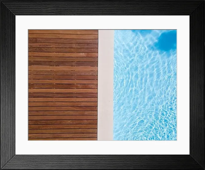 Framed Print : Drone flight over pool with nice wooden terrace surrounded by green lawn in beautiful garden Framed Print : Drone flight over pool with nice wooden terrace surrounded by green lawn in beautiful garden