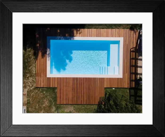 Framed Print : Drone flight over pool with nice wooden terrace surrounded by green lawn in beautiful garden Framed Print : Drone flight over pool with nice wooden terrace surrounded by green lawn in beautiful garden