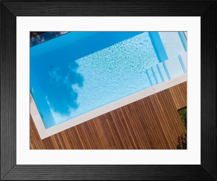 Framed Print : Drone flight over pool with nice wooden terrace surrounded by green lawn in beautiful garden Framed Print : Drone flight over pool with nice wooden terrace surrounded by green lawn in beautiful garden