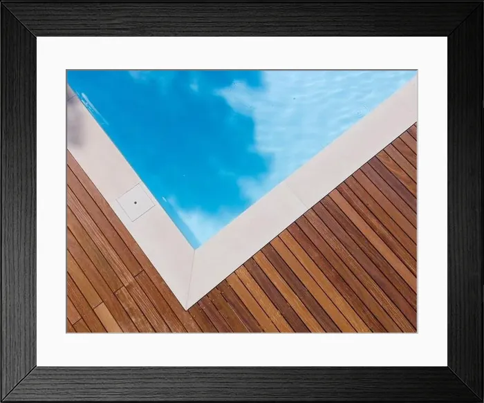 Framed Print : Drone flight over pool with nice wooden terrace surrounded by green lawn in beautiful garden Framed Print : Drone flight over pool with nice wooden terrace surrounded by green lawn in beautiful garden