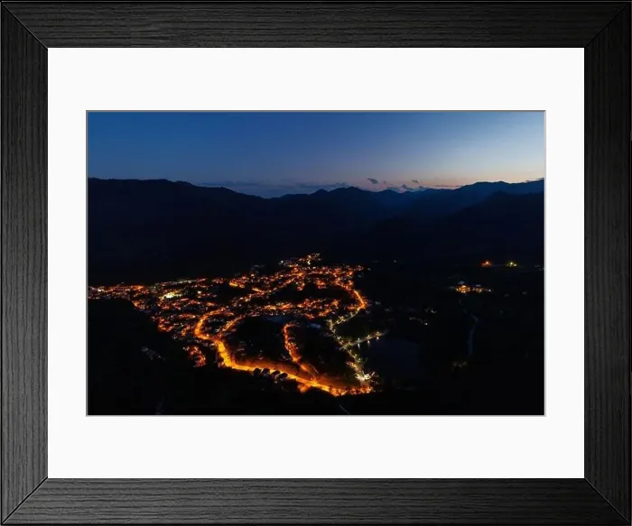 Framed Print : Bright sparkling mountain town of Smolyan with multi-colored night electric lights Framed Print : Bright sparkling mountain town of Smolyan with multi-colored night electric lights