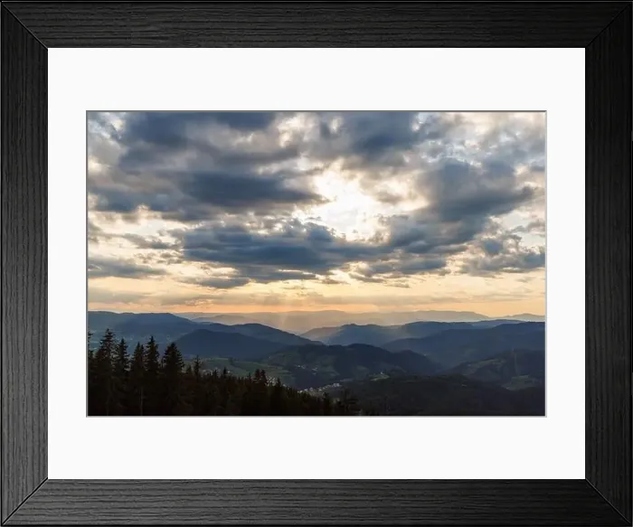 Framed Print : Cold cloudy rainy weather over low hills covered with spruce evergreen forests in Rhodope Mountains against backdrop of Framed Print : Cold cloudy rainy weather over low hills covered with spruce evergreen forests in Rhodope Mountains against backdrop of
