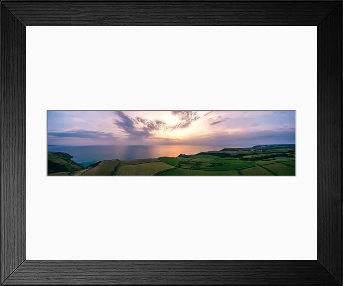 Framed Print : Sunset over Fields and Farms of Caunter Beach and Cliffs Framed Print : Sunset over Fields and Farms of Caunter Beach and Cliffs