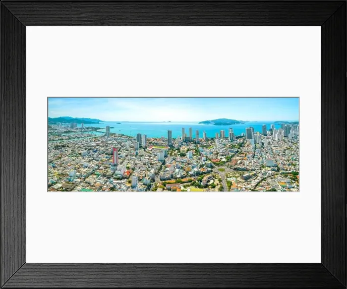 Framed Print : The coastal city of Nha Trang seen from above on a sunny summer afternoon Framed Print : The coastal city of Nha Trang seen from above on a sunny summer afternoon