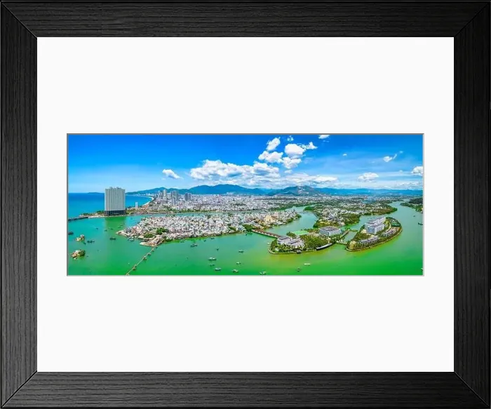 Framed Print : The coastal city of Nha Trang seen from above on a sunny summer afternoon