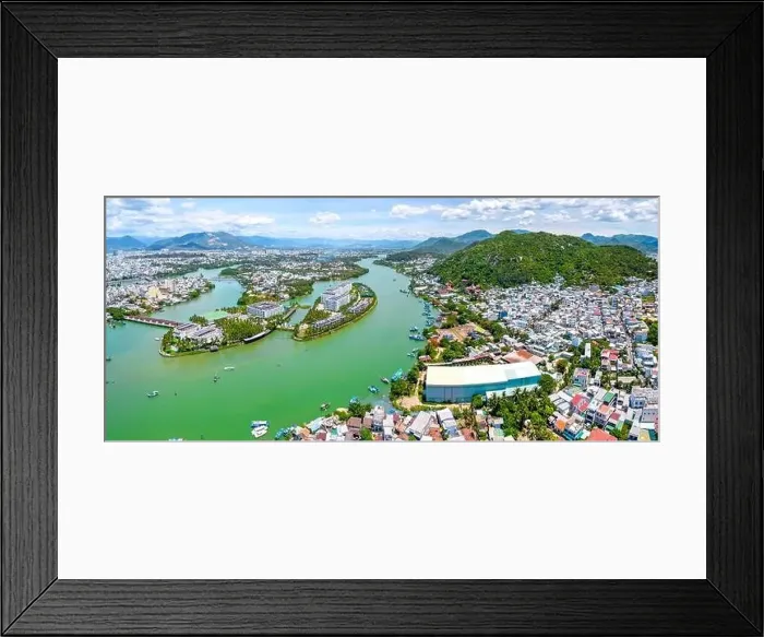 Framed Print : The coastal city of Nha Trang seen from above on a sunny summer afternoon Framed Print : The coastal city of Nha Trang seen from above on a sunny summer afternoon