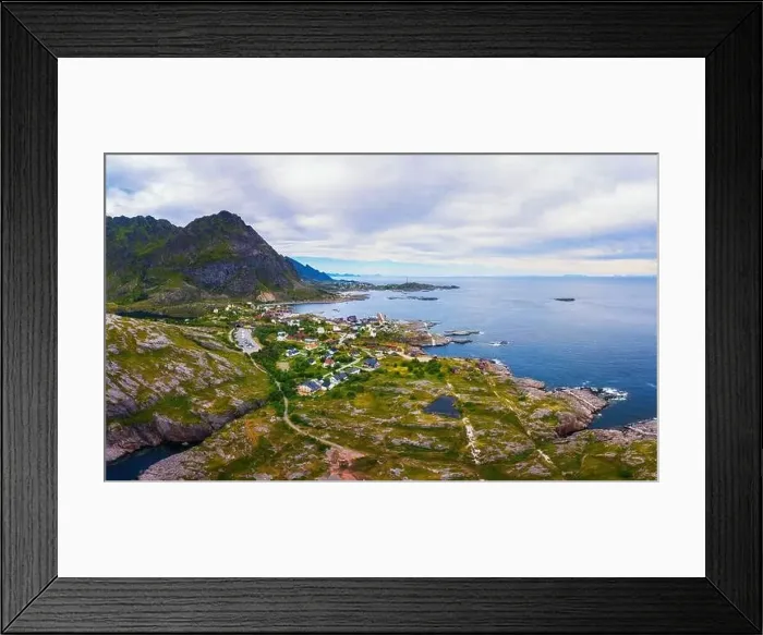 Framed Print : Reine fishing village surrounded by high mountains and fjords on Lofoten islands