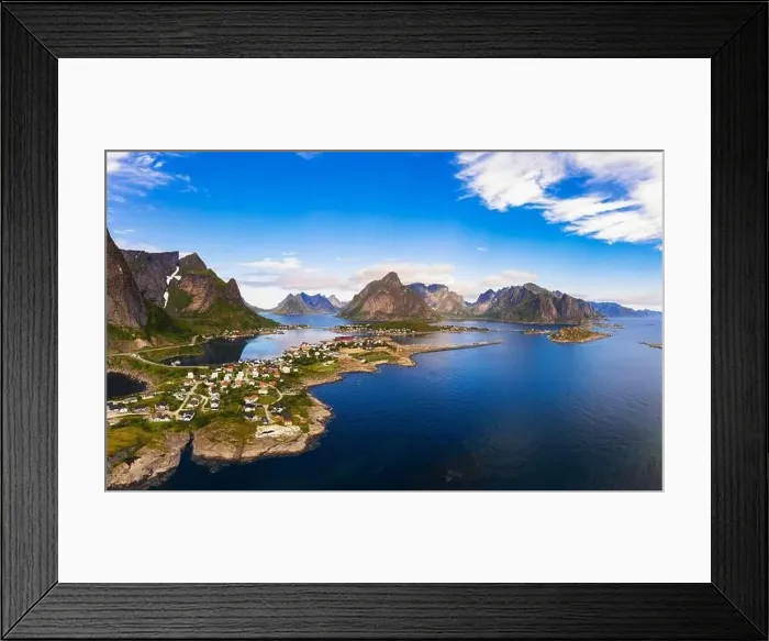 Framed Print : Reine fishing village surrounded by high mountains and fjords on Lofoten islands Framed Print : Reine fishing village surrounded by high mountains and fjords on Lofoten islands