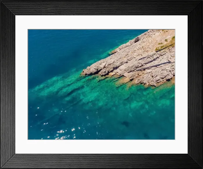 Framed Print : The pipe drains the sewer into the sea. Environmental pollution. Drone view Framed Print : The pipe drains the sewer into the sea. Environmental pollution. Drone view