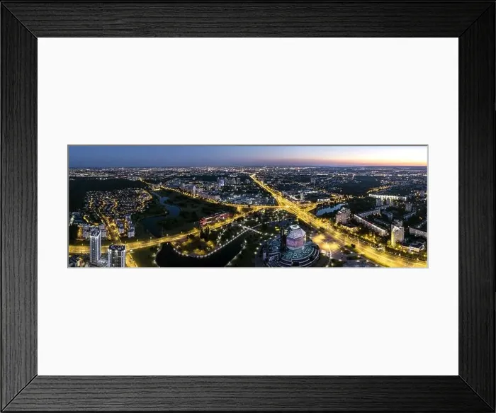 Framed Print : picturesque panoramic aerial view cityscape with bright street illumination. drone photo Framed Print : picturesque panoramic aerial view cityscape with bright street illumination. drone photo