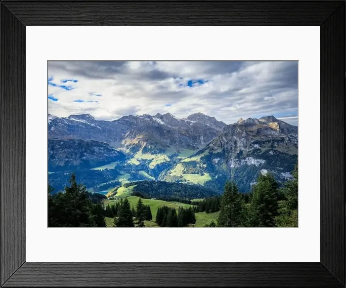 Framed Print : Hiking near Engelberg with a view of the Swiss Alps, summer Framed Print : Hiking near Engelberg with a view of the Swiss Alps, summer