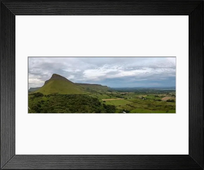 Framed Print : A panorama landscape of County Sligo with the Benbulbin mountain peak and ridge under a cloudy evening sky Framed Print : A panorama landscape of County Sligo with the Benbulbin mountain peak and ridge under a cloudy evening sky