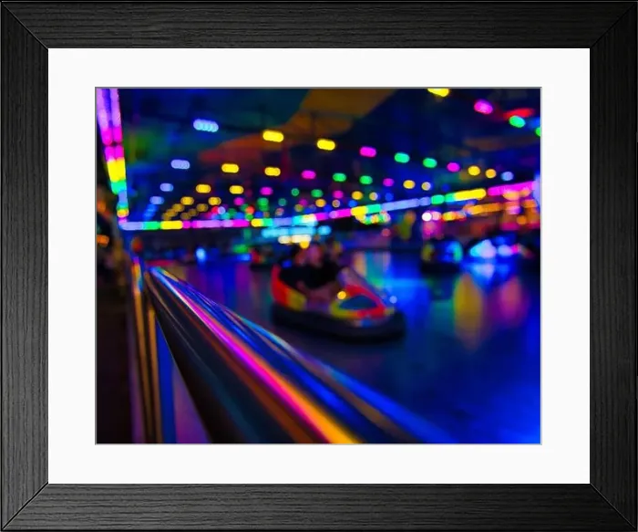 Framed Print : The colorful neon lights at a bumper car park Framed Print : The colorful neon lights at a bumper car park
